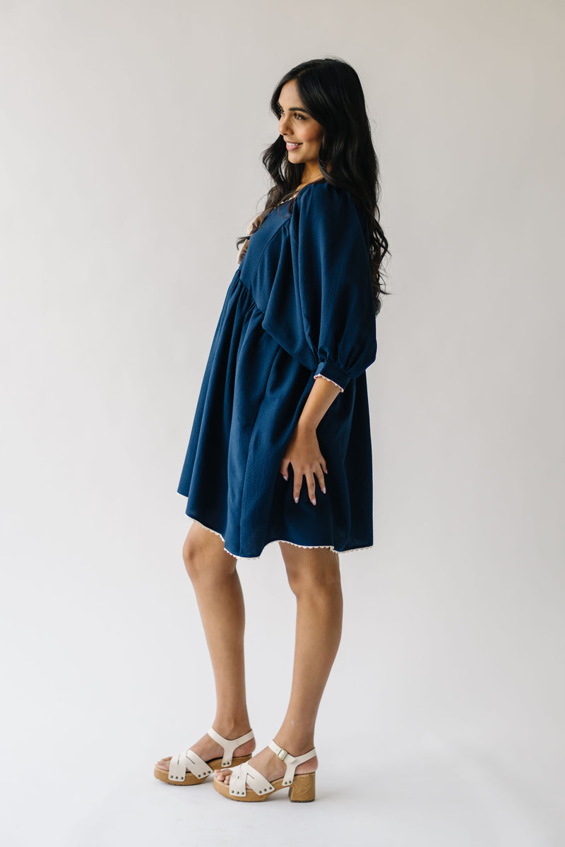 The Kunz Rosette Detail Dress in Navy