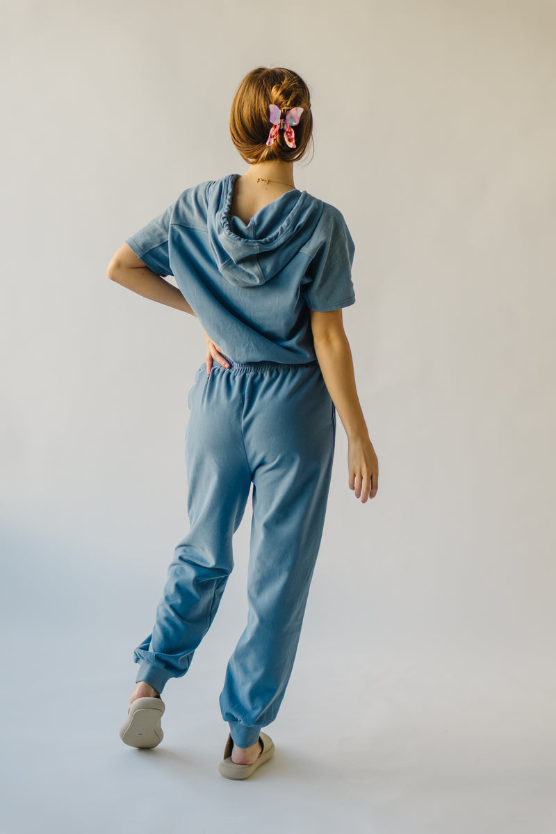 The Sullins Hooded Jumpsuit in Denim Blue