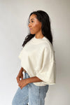 The Trisney Mock Neck Sweater in Ivory