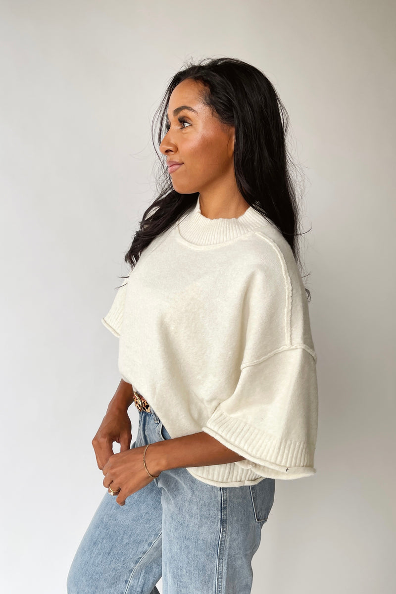 The Trisney Mock Neck Sweater in Ivory