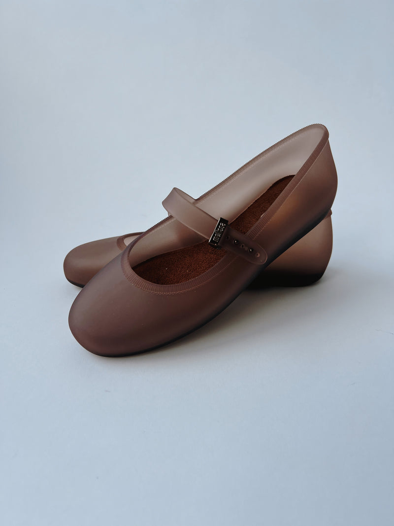 Melissa: The Soft Ballerina Sandal in Clear Brown