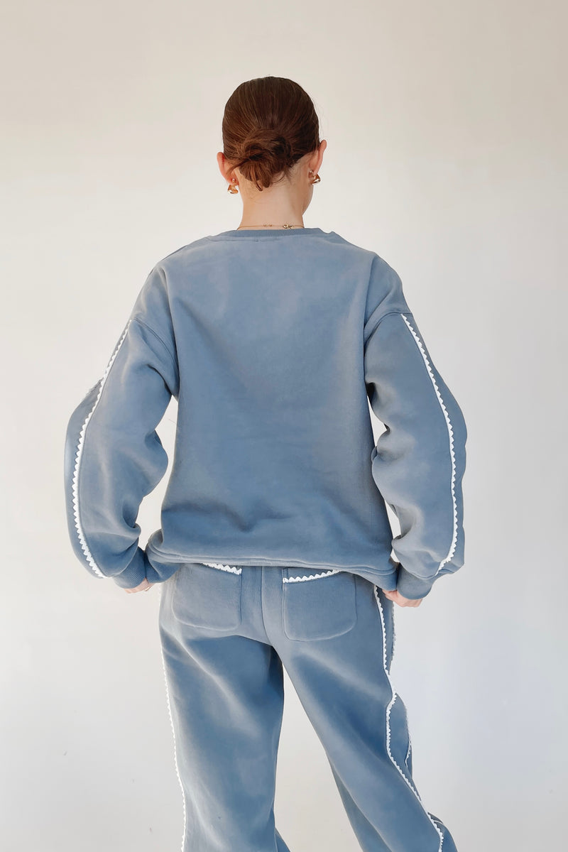The Sandrea Lace Trim Sweatshirt in Dusty Blue