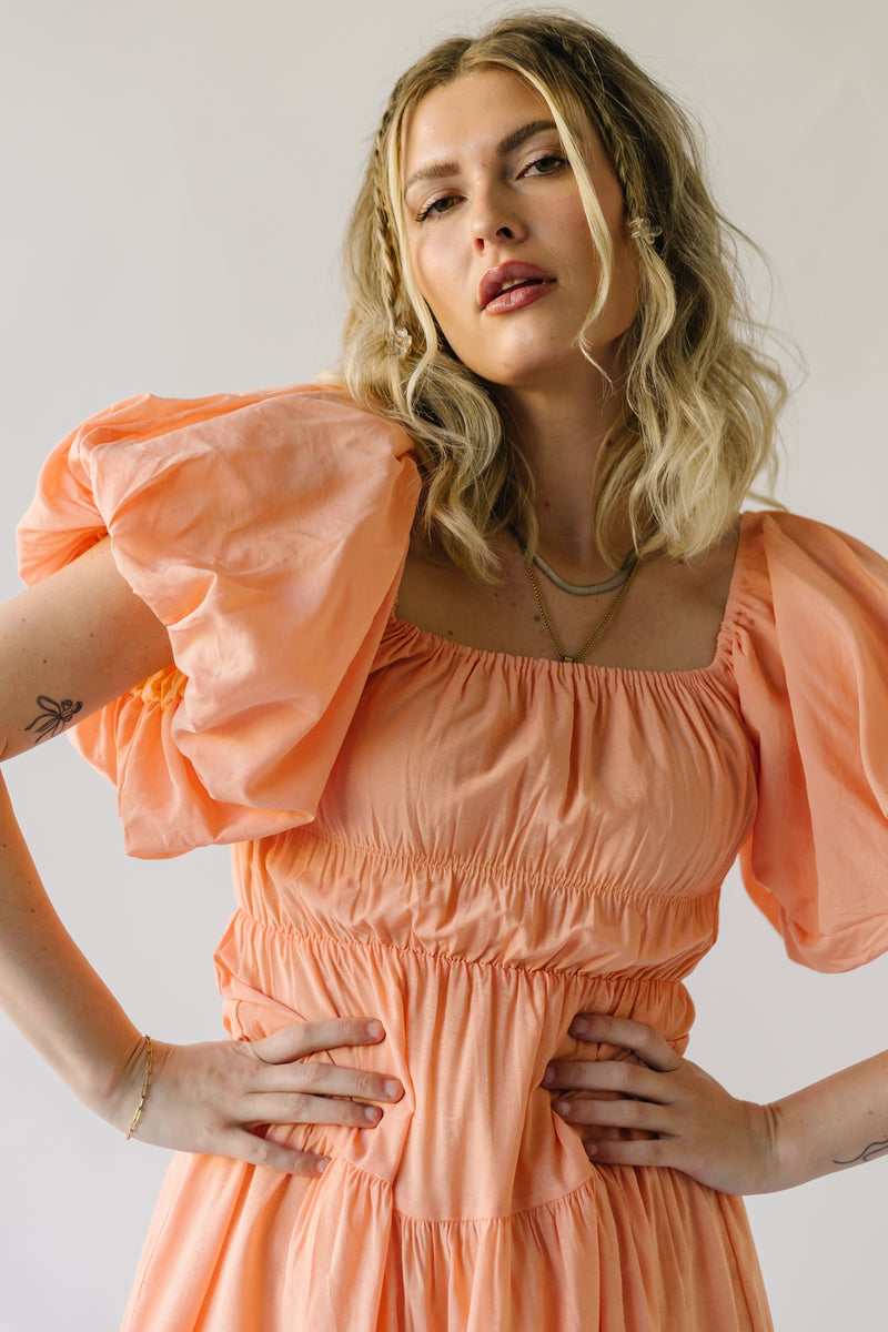 The Dismuke Tiered Midi Dress in Peach