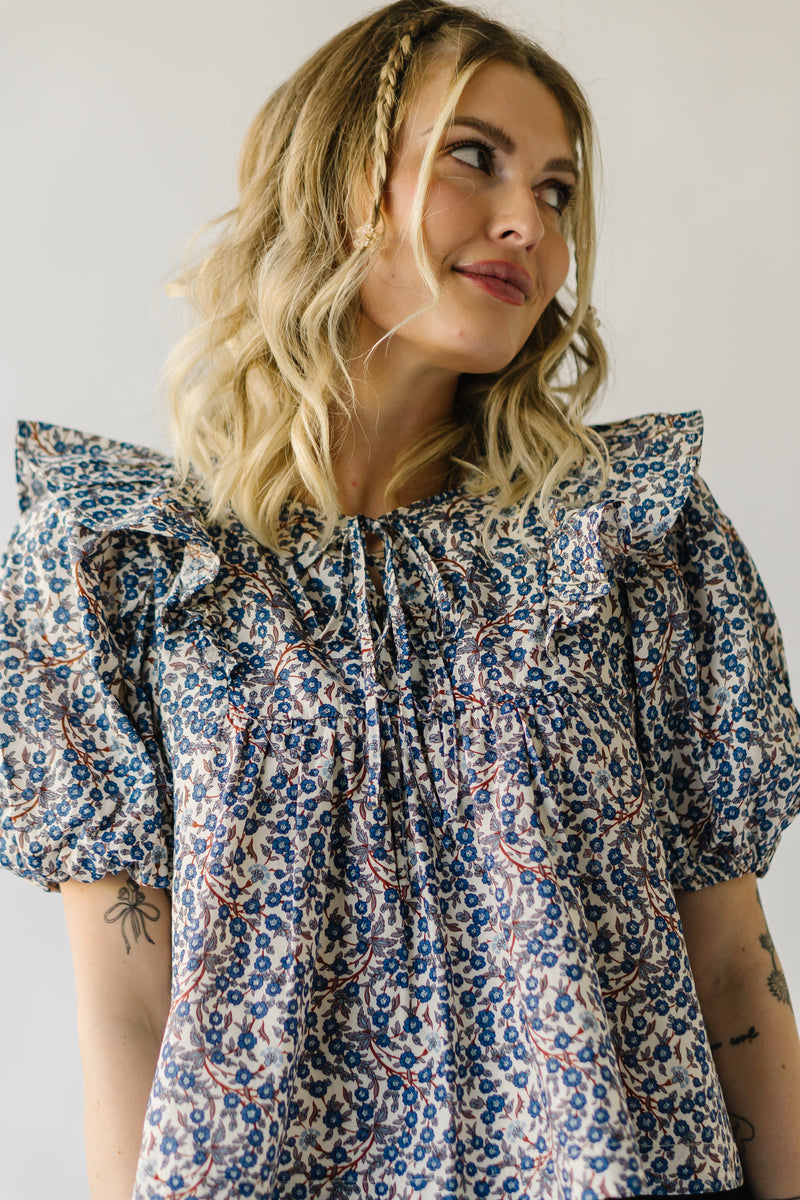 The Alger Ruffle Detail Blouse in Blue Floral