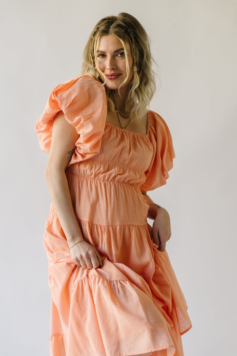 The Dismuke Tiered Midi Dress in Peach