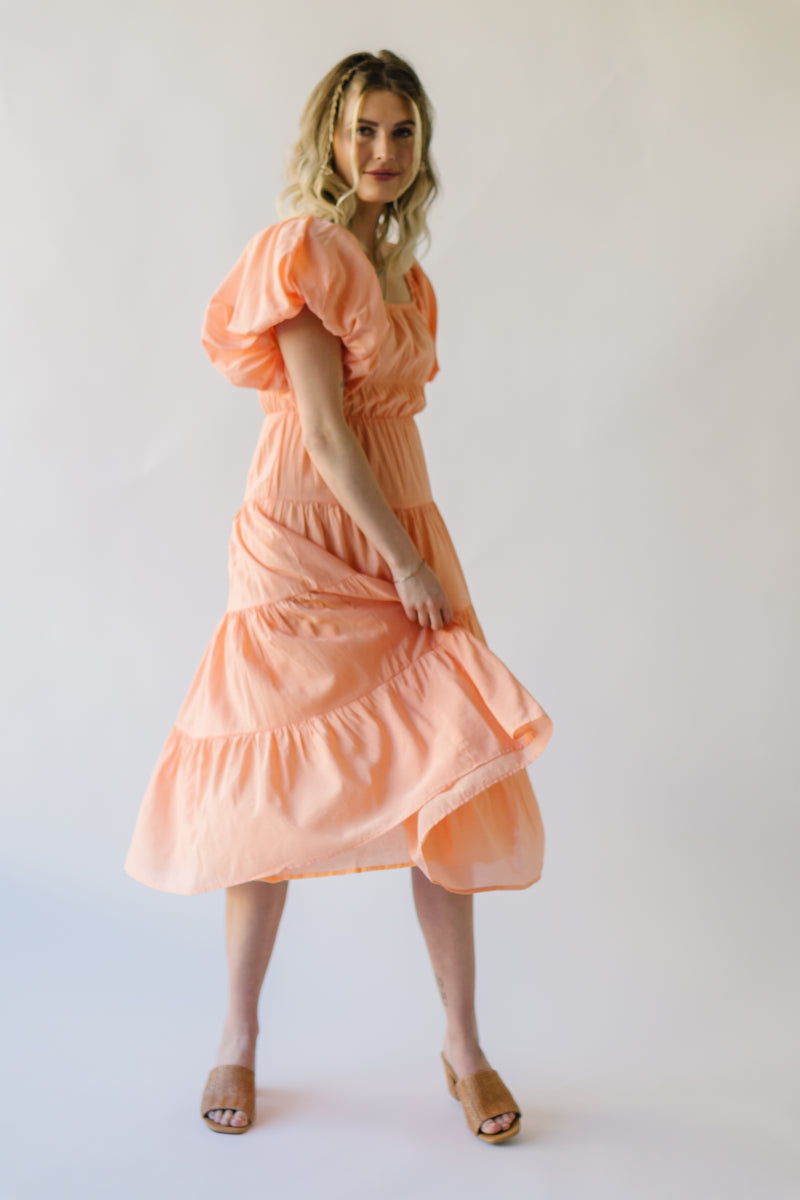 The Dismuke Tiered Midi Dress in Peach