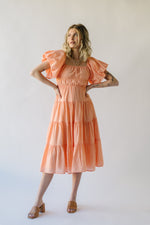 The Dismuke Tiered Midi Dress in Peach