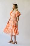 The Dismuke Tiered Midi Dress in Peach