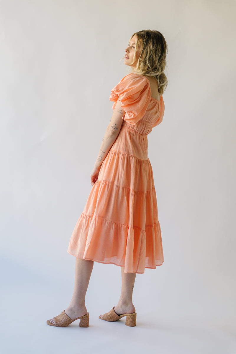 The Dismuke Tiered Midi Dress in Peach
