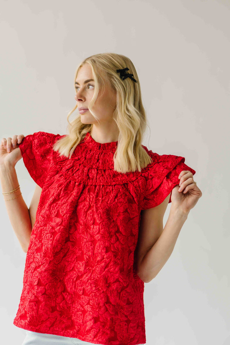 The Timpson Textured Ruffle Blouse in Red