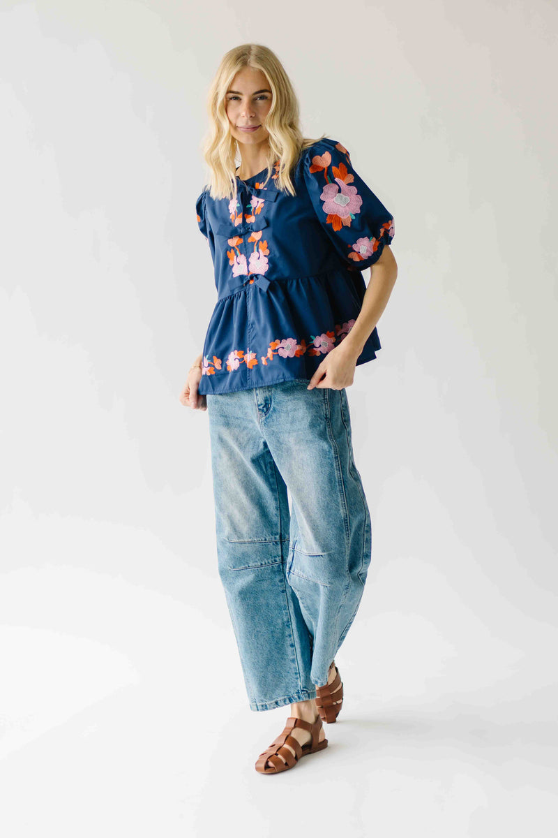 The Jenks Embroidered Front Tie Blouse in Navy
