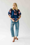 The Jenks Embroidered Front Tie Blouse in Navy