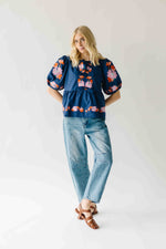 The Jenks Embroidered Front Tie Blouse in Navy