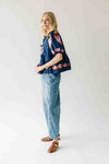 The Jenks Embroidered Front Tie Blouse in Navy