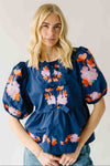 The Jenks Embroidered Front Tie Blouse in Navy