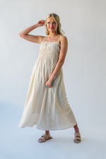 The Frisco Pleated Maxi Dress in Champagne
