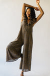 The Hutchings Ruffled Wide Leg Jumpsuit in Charcoal + Mustard