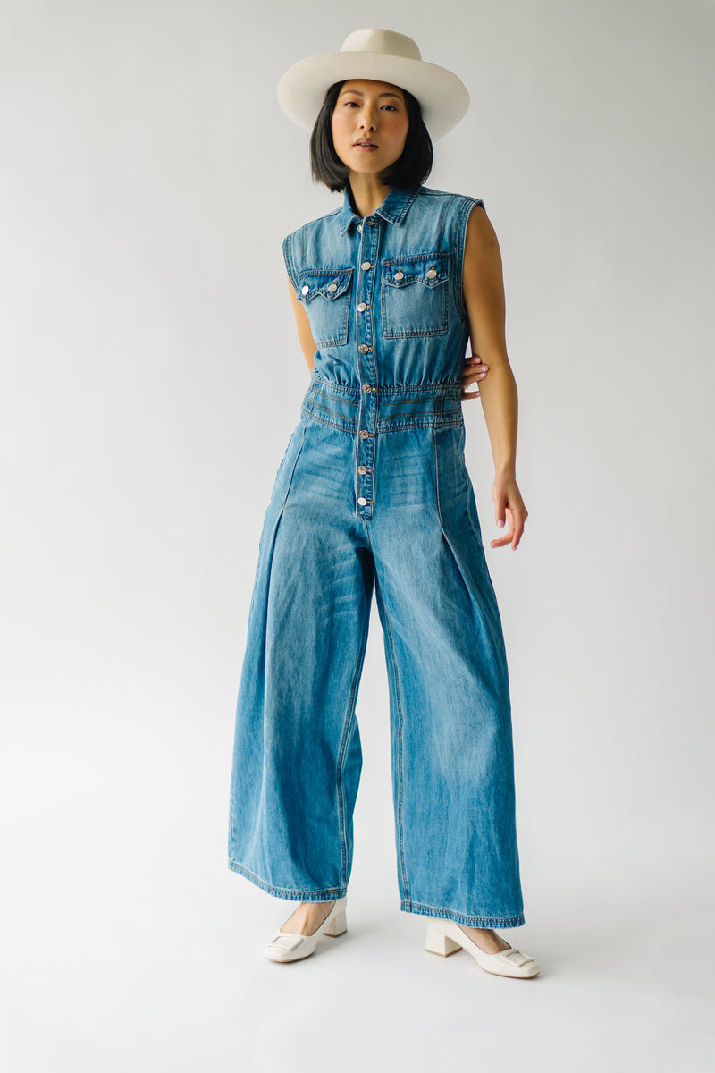 The Houmand Button-Up Jumpsuit in Light Denim
