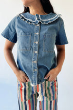 The Marasol Ruffle Collared Blouse in Denim