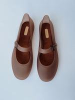 Melissa: The Soft Ballerina Sandal in Clear Brown