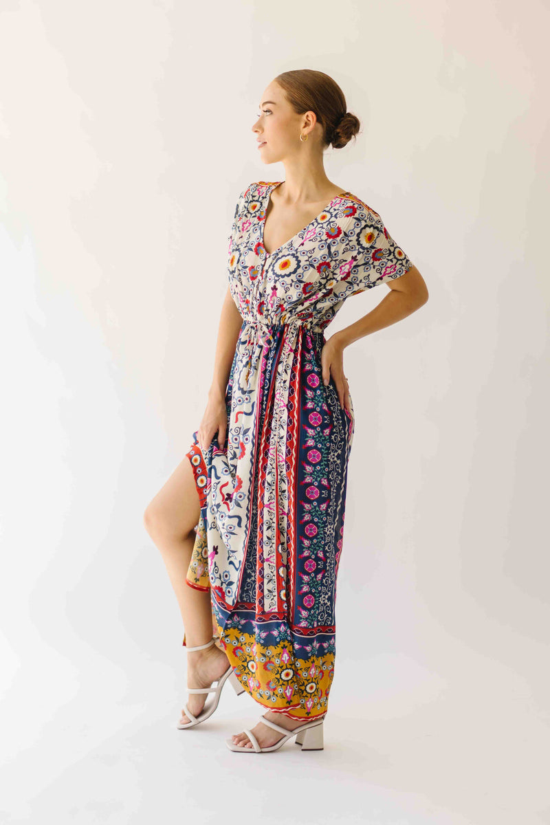The Falvey Patterned V-Neck Maxi Dress in Multi