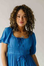 The Munson Intricate Ruffle Maxi Dress in Blue
