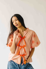 The Jandi Tie Front Blouse in Orange Stripe