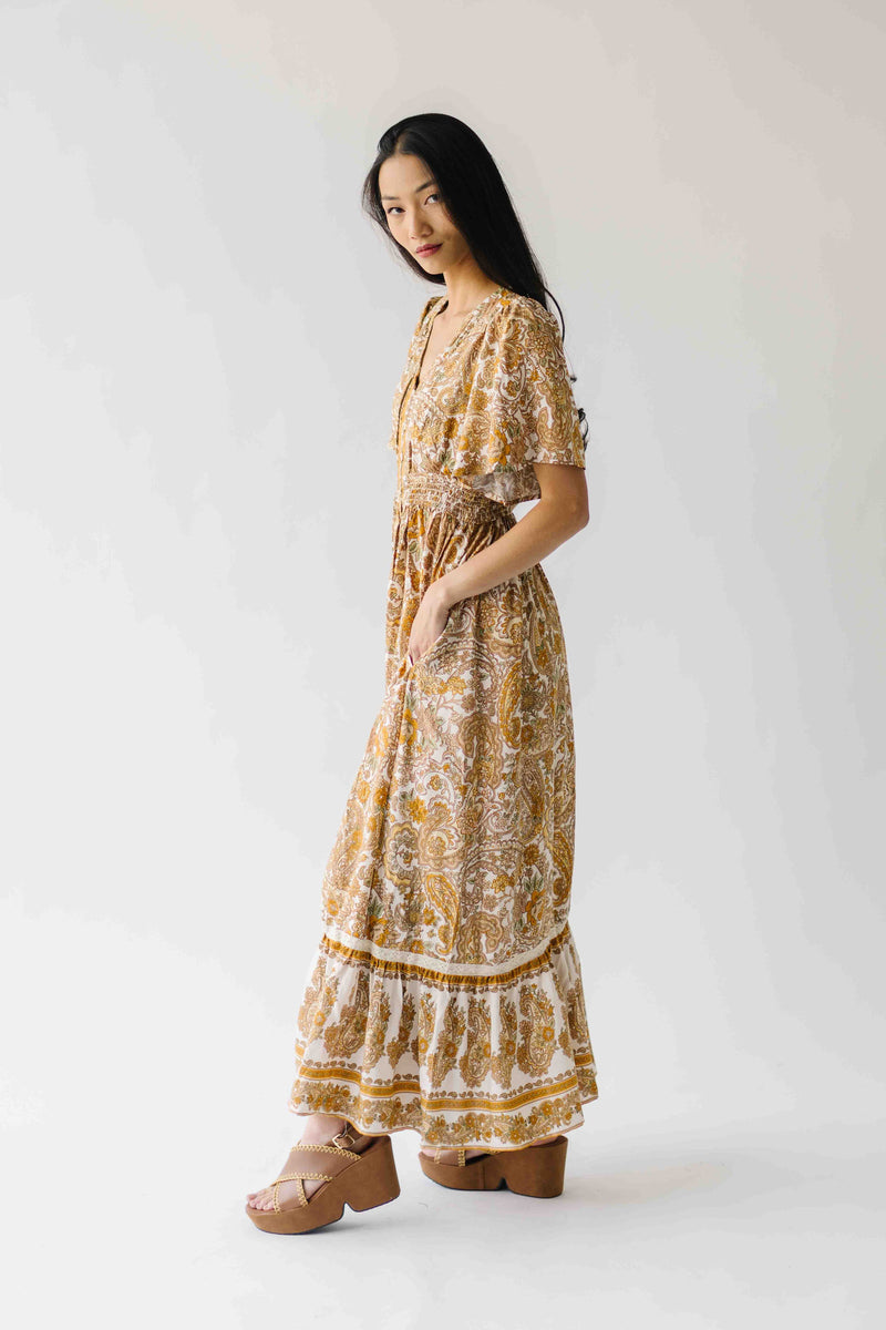 The Langston Flutter Sleeve Floral Maxi Dress in Antique Gold