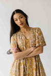 The Langston Flutter Sleeve Floral Maxi Dress in Antique Gold
