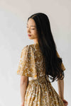 The Langston Flutter Sleeve Floral Maxi Dress in Antique Gold