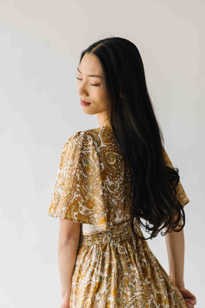 The Langston Flutter Sleeve Floral Maxi Dress in Antique Gold