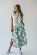 The Epling Button Front Midi Skirt in Blue + Green Floral