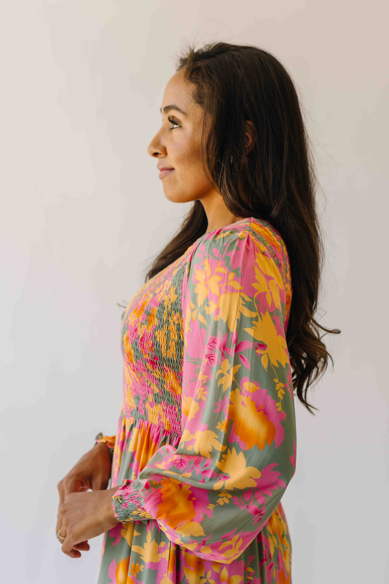 The Kensley Smocked Bodice Maxi Dress in Olive Floral