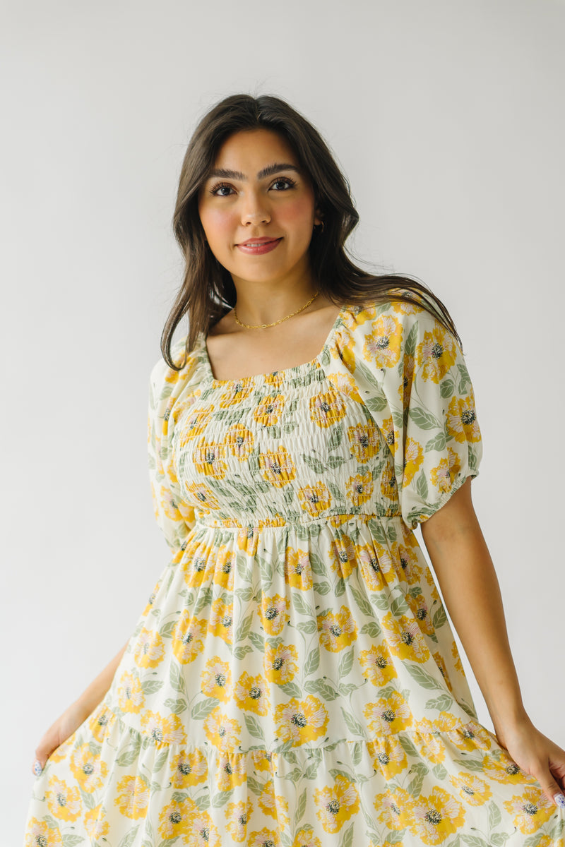 The Indy Smocked Floral Midi Dress in Luminous Marigold