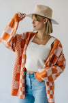 The Off the Wall Checkered Cardigan in Melon