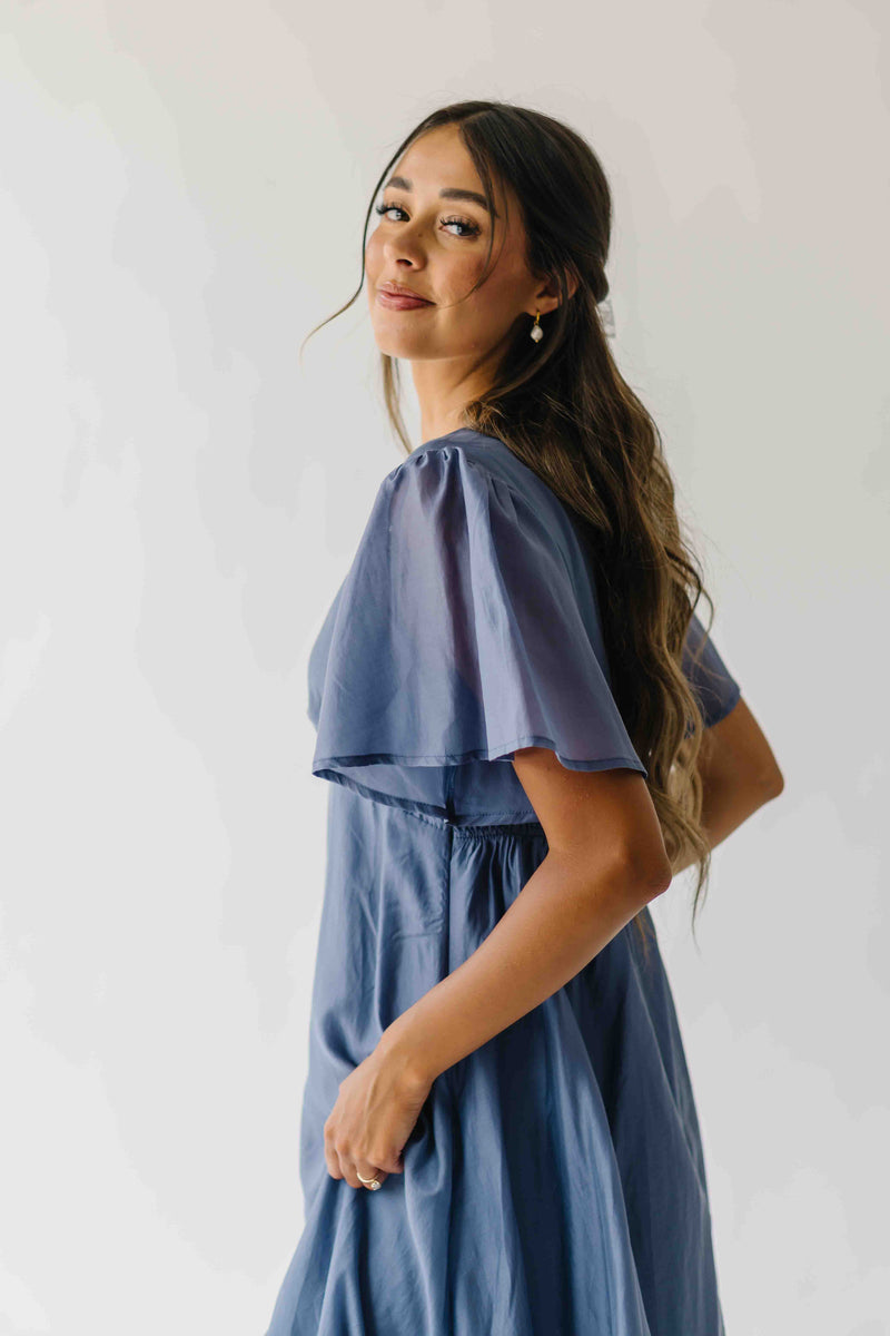 The Harston Flutter Sleeve Maxi Dress in Midnight Blue