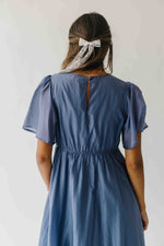 The Harston Flutter Sleeve Maxi Dress in Midnight Blue