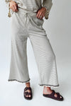 The Lyla Ruffle Edge Striped Pant in Cream + Brown