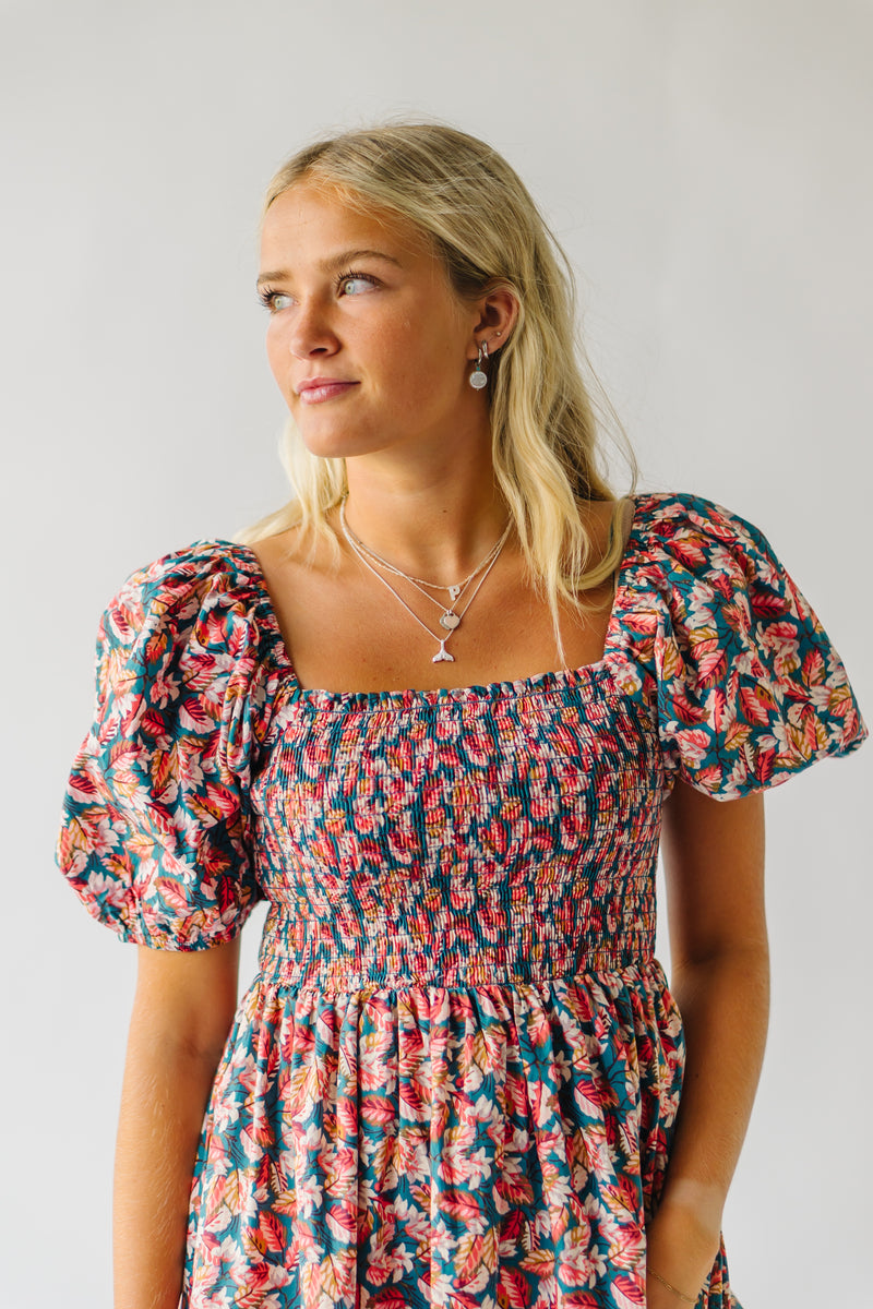 The Rigtrup Smocked Maxi Dress in Teal Multi