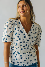 The Binford Dot Wrap Blouse in Cream