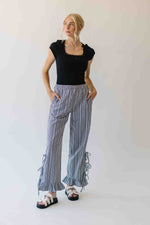 The Eliza Gingham Ruffle Hem Pant in Black