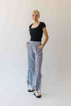 The Eliza Gingham Ruffle Hem Pant in Black