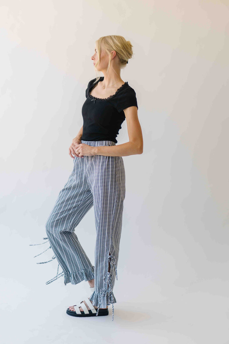 The Eliza Gingham Ruffle Hem Pant in Black