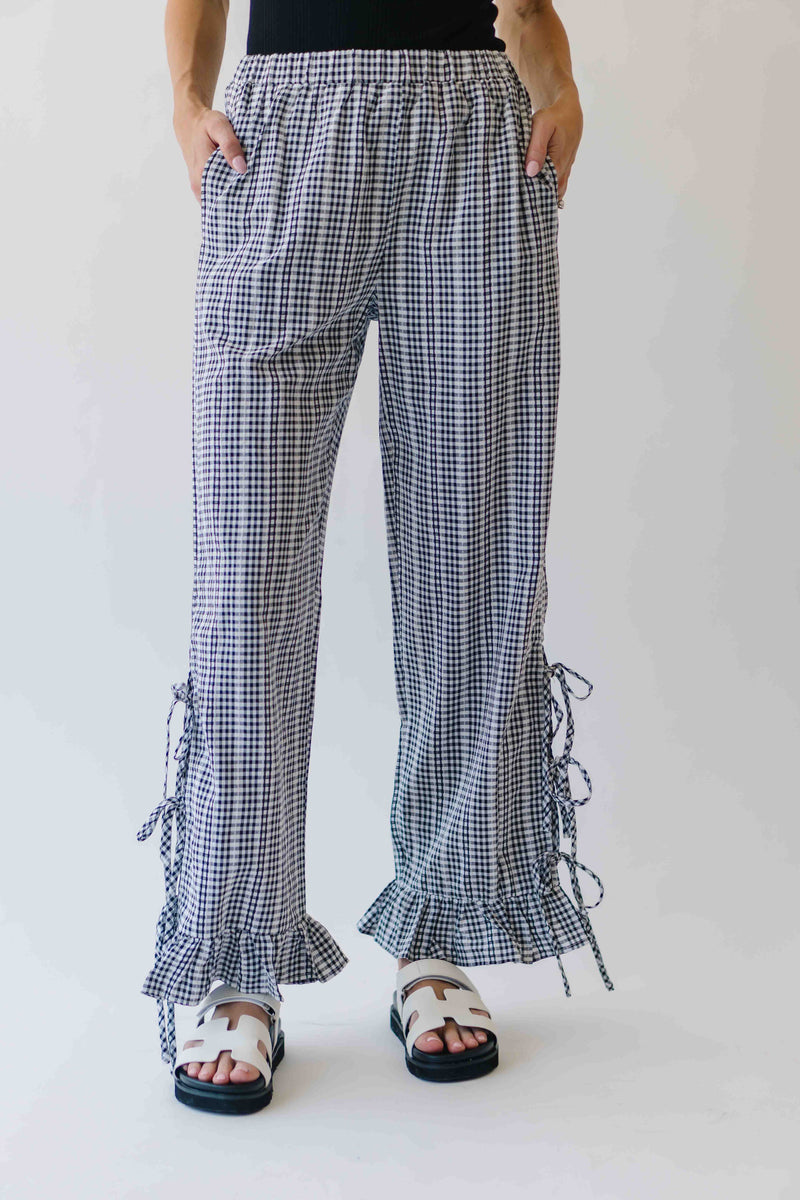 The Eliza Gingham Ruffle Hem Pant in Black