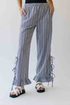 The Eliza Gingham Ruffle Hem Pant in Black