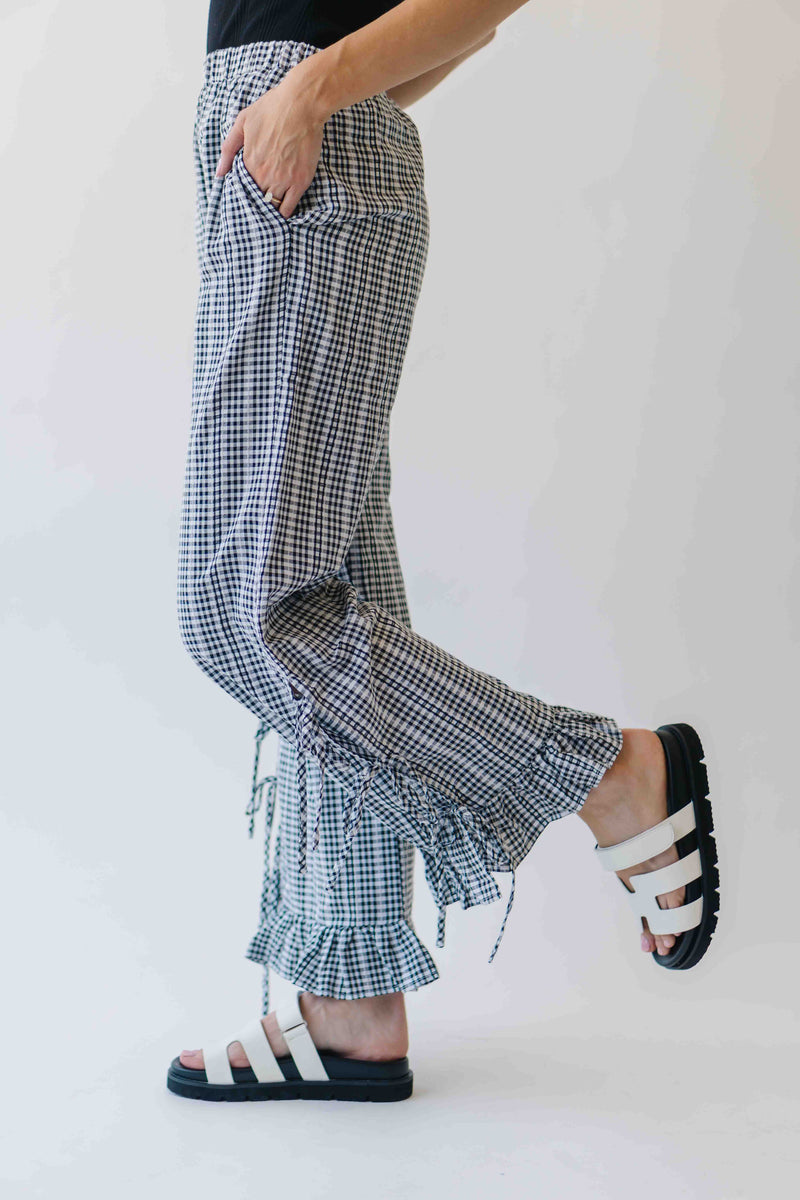 The Eliza Gingham Ruffle Hem Pant in Black