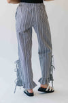 The Eliza Gingham Ruffle Hem Pant in Black