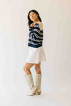 The Reina Scalloped Trim Cardigan in Navy + Taupe Stripe