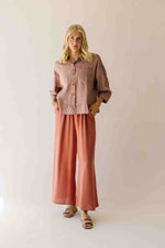 The Allona Ruffle Hem Button-Up Blouse in Mauve