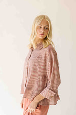 The Allona Ruffle Hem Button-Up Blouse in Mauve